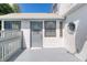 Gray deck with door leading to the house at 4001 Cree Dr, Ormond Beach, FL 32174