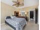 Main bedroom with a comfortable bed and built-in shelving at 404 S Beach St # 304, Daytona Beach, FL 32114