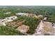 Wide aerial view of the property and surrounding area, showing the home's location at 42847 Cooter Pond Rd, Deland, FL 32720