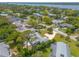 Aerial view of a home near the water with a large backyard at 469 S Halifax Dr, Ormond Beach, FL 32176