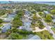 An aerial view of a house with a large yard and ocean view at 469 S Halifax Dr, Ormond Beach, FL 32176