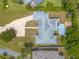 Aerial view of a home showcasing its roofline, driveway and yard at 469 S Halifax Dr, Ormond Beach, FL 32176