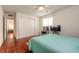 Spacious bedroom with hardwood floors and large closet at 469 S Halifax Dr, Ormond Beach, FL 32176