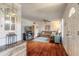 Bright living room with hardwood floors, comfy couch, and coastal decor at 469 S Halifax Dr, Ormond Beach, FL 32176