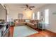 Spacious living room with hardwood floors, sectional sofa, and coastal decor at 469 S Halifax Dr, Ormond Beach, FL 32176