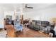 Living room with gray couch and blue armchair at 501 W Lisbon Pkwy, Deland, FL 32720