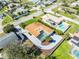 Wide aerial shot showcasing the property's layout, private pool area, landscaping, and neighborhood setting at 681 N Halifax Dr, Ormond Beach, FL 32176
