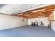 Large garage with overhead lighting, and laundry machines at 681 N Halifax Dr, Ormond Beach, FL 32176
