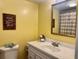 Clean bathroom with updated vanity and shower at 701 Perkins St # 100, Leesburg, FL 34748