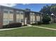 Brick building with entrance and landscaping at 701 Perkins St # 100, Leesburg, FL 34748