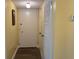 Light and bright entryway with neutral walls at 701 Perkins St # 100, Leesburg, FL 34748