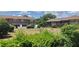 Multi-Gathering property features well-maintained landscaping and inviting outdoor communal space at 701 Perkins St # 100, Leesburg, FL 34748
