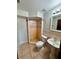 Bathroom with shower, toilet and pedestal sink at 8101 Via Bonita St, Sanford, FL 32771