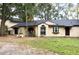 Ranch style home with a large front yard and fountain at 8101 Via Bonita St, Sanford, FL 32771
