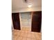 Laundry room with shelving and tile floor at 8101 Via Bonita St, Sanford, FL 32771