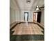 Spacious living room with tile floors and access to other rooms at 8101 Via Bonita St, Sanford, FL 32771