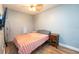 This simple bedroom with vinyl floors provides a comfortable and relaxing space at 878 Abbott Ave, Deltona, FL 32725