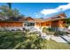 Charming home featuring a landscaped front yard with a sidewalk and stylish accents at 878 Abbott Ave, Deltona, FL 32725