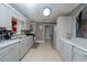 Modern kitchen with stainless steel appliances and granite countertops at 878 Abbott Ave, Deltona, FL 32725