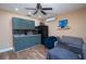 Cozy living space with kitchenette, modern fixtures, and comfortable seating at 878 Abbott Ave, Deltona, FL 32725