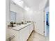 Double vanity bathroom with granite countertops at 962 Compass Landing Dr, Orange City, FL 32763
