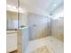 Walk-in shower with modern tile and glass enclosure at 962 Compass Landing Dr, Orange City, FL 32763