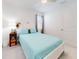 Bright bedroom with a full-size bed and plenty of natural light at 962 Compass Landing Dr, Orange City, FL 32763