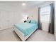 Charming bedroom with a light teal comforter and window coverings at 962 Compass Landing Dr, Orange City, FL 32763