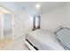 Spacious bedroom with double doors and plush carpeting at 962 Compass Landing Dr, Orange City, FL 32763
