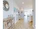 View of the entryway that shows the living and kitchen areas at 962 Compass Landing Dr, Orange City, FL 32763