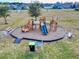 Community playground with playset, slides, and benches at 962 Compass Landing Dr, Orange City, FL 32763