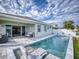 Inviting pool area with spacious patio and modern design at 962 Compass Landing Dr, Orange City, FL 32763