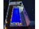 Night view of a refreshing pool with surrounding lights at 962 Compass Landing Dr, Orange City, FL 32763