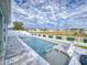 Refreshing pool with ample deck space for lounging at 962 Compass Landing Dr, Orange City, FL 32763