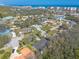 A high vantage point shows this home nestled in a scenic neighborhood close to a picturesque coastline at 123 Ponce Terrace Cir, Ponce Inlet, FL 32127
