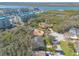 A high-angle view features this home, with a view of a serene, waterfront community with condos at 123 Ponce Terrace Cir, Ponce Inlet, FL 32127