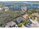 This elevated shot captures this house, part of a community near a picturesque coastal landscape and waterway at 123 Ponce Terrace Cir, Ponce Inlet, FL 32127
