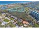 A high-angle shot features this home nestled within a quiet community close to the shore at 123 Ponce Terrace Cir, Ponce Inlet, FL 32127