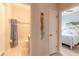 Bathroom with a shower, toilet and blue vanity at 123 Ponce Terrace Cir, Ponce Inlet, FL 32127