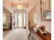 Light and airy entryway with a chandelier and decorative items at 123 Ponce Terrace Cir, Ponce Inlet, FL 32127