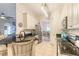 Modern kitchen with granite countertops and stainless steel appliances at 123 Ponce Terrace Cir, Ponce Inlet, FL 32127
