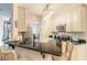 Updated kitchen with granite counters and stainless steel appliances at 123 Ponce Terrace Cir, Ponce Inlet, FL 32127