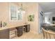 Kitchen features a built-in desk and updated cabinetry at 123 Ponce Terrace Cir, Ponce Inlet, FL 32127