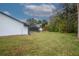 Large backyard with a pool and shed at 130 Old Sunbeam Dr, South Daytona, FL 32119