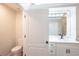 Clean bathroom with toilet and vanity at 130 Old Sunbeam Dr, South Daytona, FL 32119