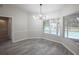 Bright dining room with pool view and tile floors at 130 Old Sunbeam Dr, South Daytona, FL 32119