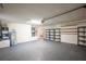 Garage with shelving and extra storage at 130 Old Sunbeam Dr, South Daytona, FL 32119