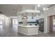 Open concept kitchen features quartz countertops, stainless appliances, and a tile backsplash at 130 Old Sunbeam Dr, South Daytona, FL 32119