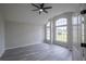 Bright office features gray tile floors and large windows at 130 Old Sunbeam Dr, South Daytona, FL 32119
