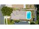 Aerial view of a private pool, brick patio, privacy fence, shed and manicured lawn at 1413 La Paloma Cir, Winter Springs, FL 32708